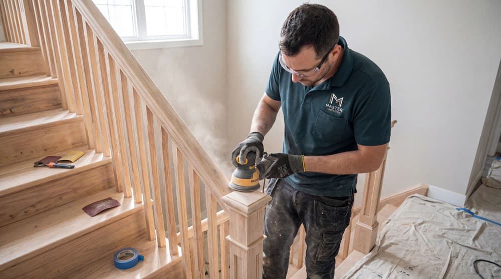 Sanding staircase railings